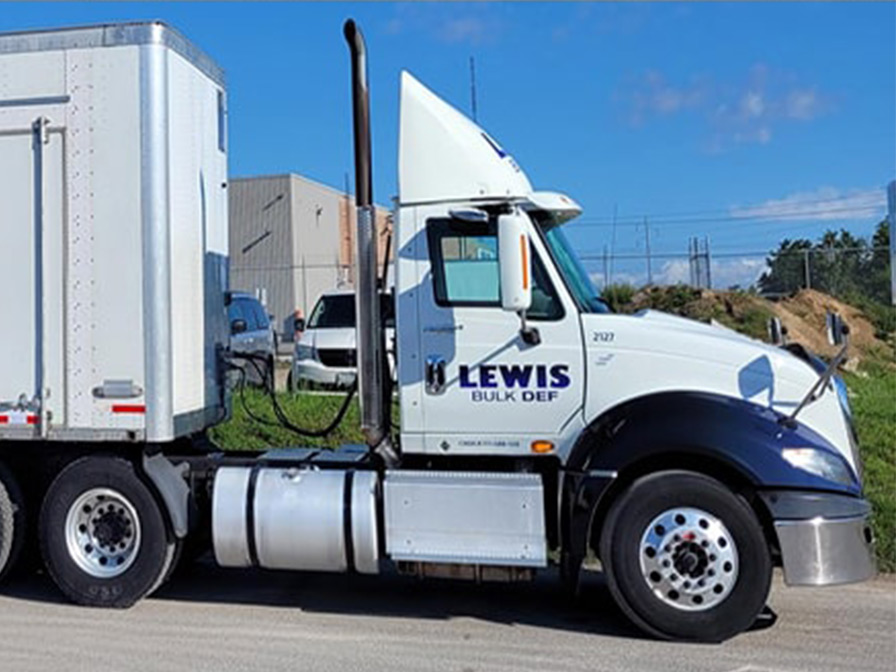 Lewis Bulk DEF delivery truck with box trailer for packaged DEF jugs and drums in Ontario